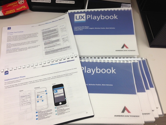 Photo of printed version of UX Playbooks